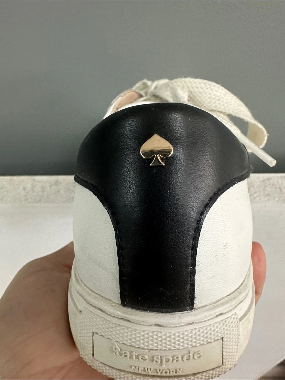 kate spade White Leather Sneakers with Black Heel Accent